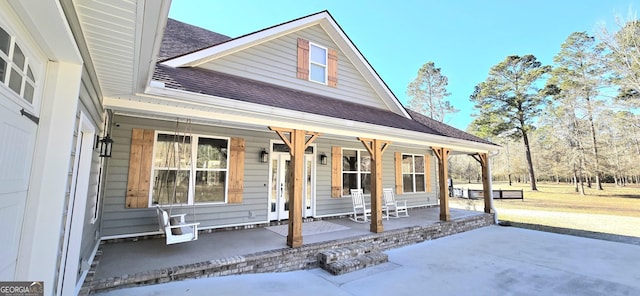 exterior space featuring covered porch