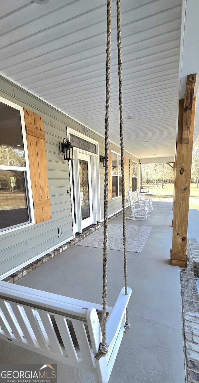 view of patio / terrace with a porch