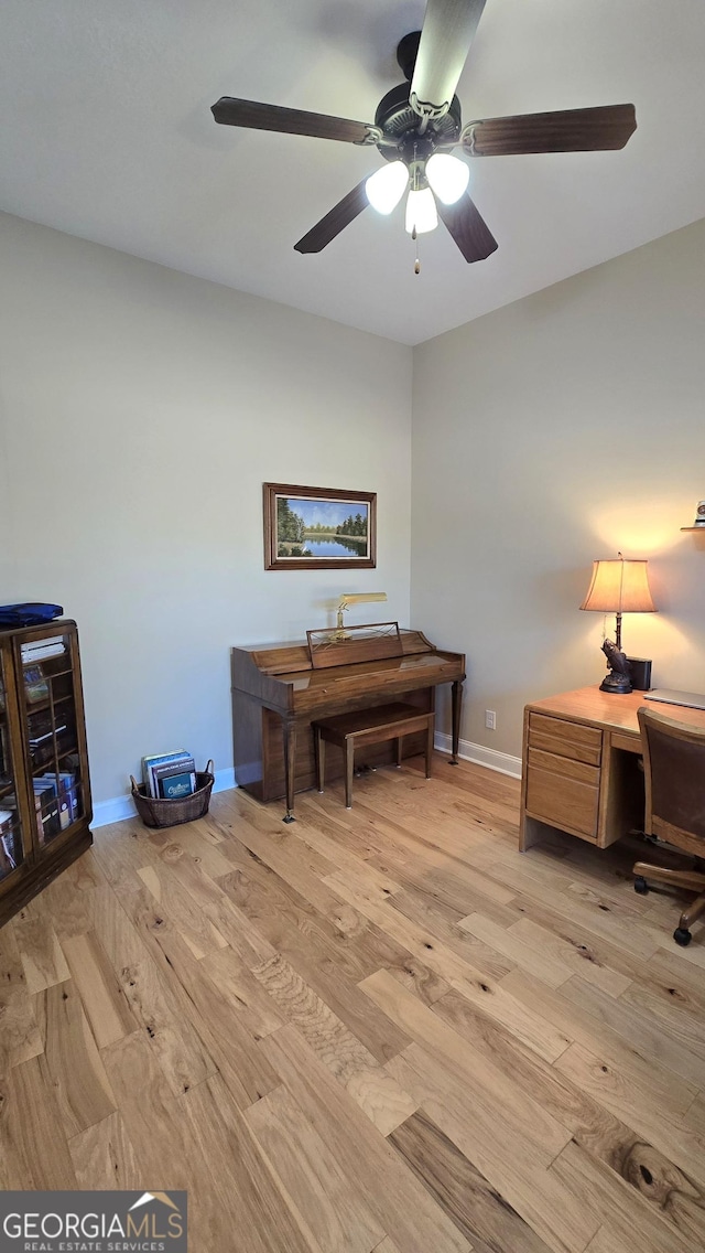 office area featuring ceiling fan and light wood-type flooring