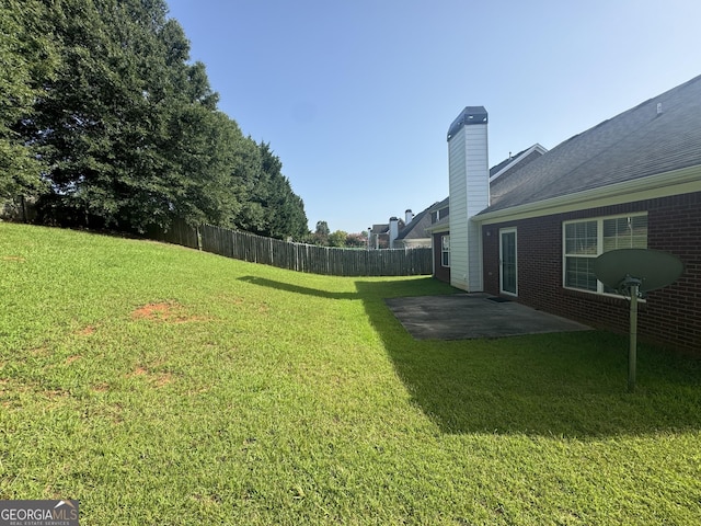 view of yard with a patio area