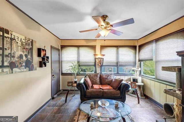 sunroom / solarium with ceiling fan and plenty of natural light