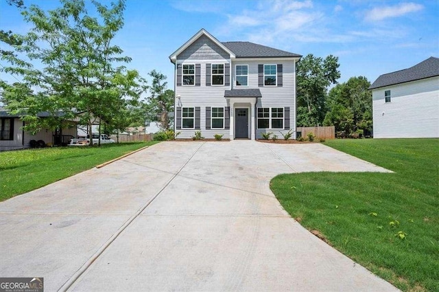 view of front of property with a front lawn