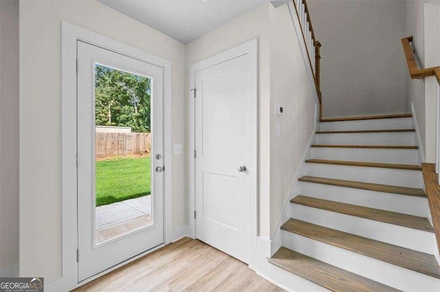 doorway with light hardwood / wood-style flooring