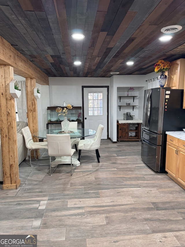 dining space with wooden ceiling