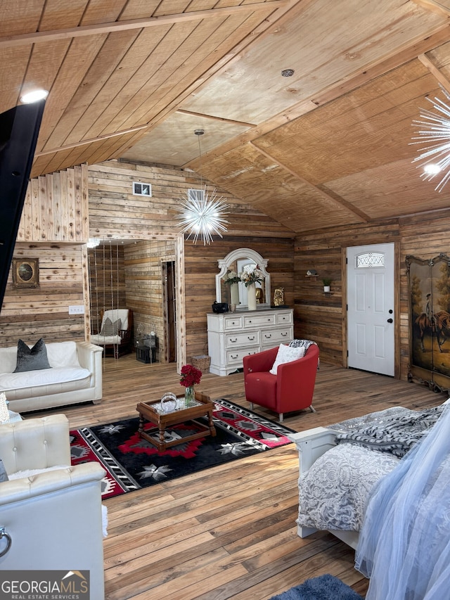 living room featuring wood-type flooring, wood walls, wood ceiling, and vaulted ceiling