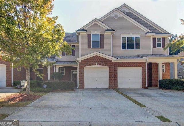 view of front of home with a garage