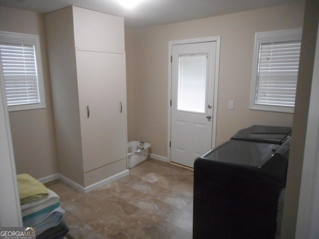 laundry area featuring independent washer and dryer