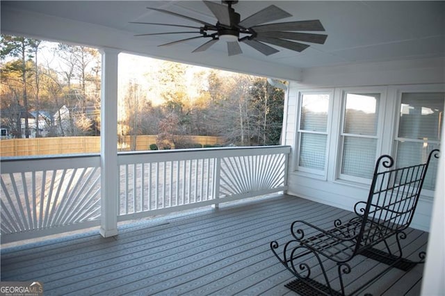 wooden terrace with ceiling fan