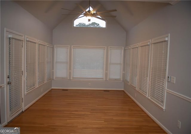 interior space featuring vaulted ceiling and ceiling fan