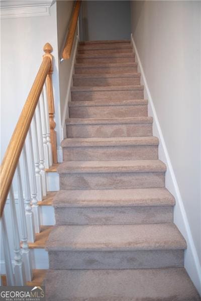 staircase with ornamental molding