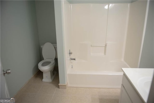 full bathroom featuring tile patterned flooring, vanity, toilet, and bathing tub / shower combination