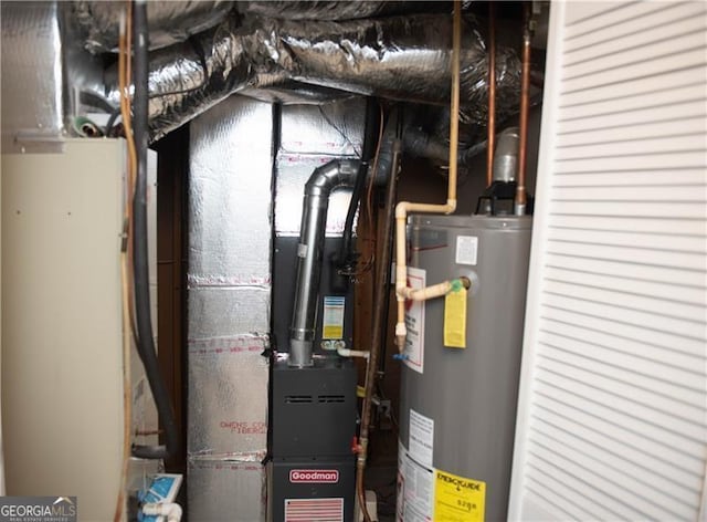 utility room with gas water heater