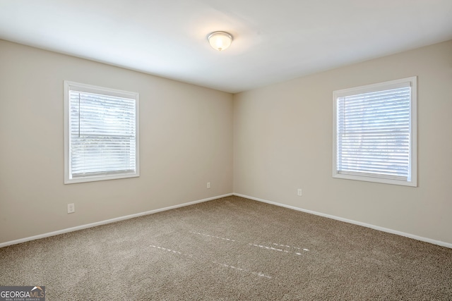 view of carpeted spare room