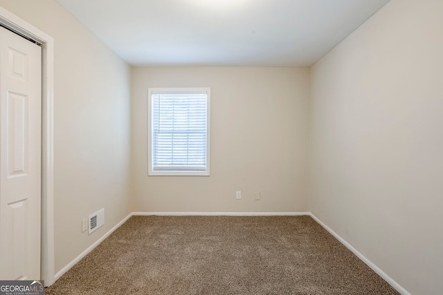 empty room with carpet floors