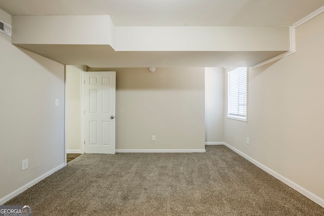 basement with carpet flooring