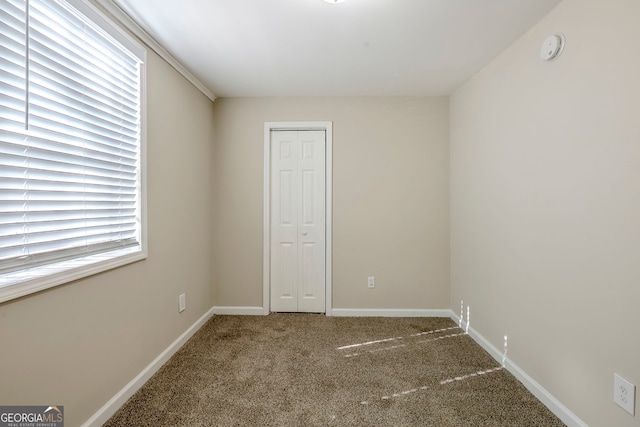 view of carpeted empty room