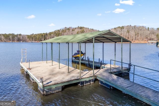 view of dock with a water view