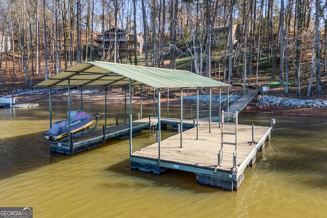 dock area featuring a water view