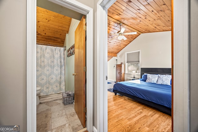 bedroom featuring ceiling fan, lofted ceiling, and wood ceiling