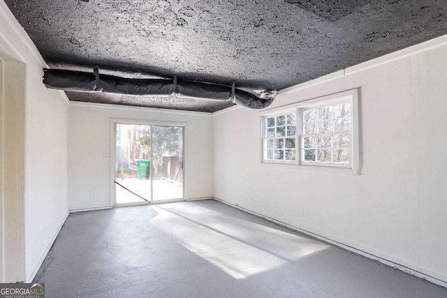 spare room featuring concrete floors