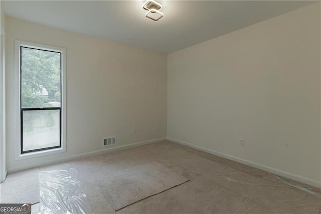 view of carpeted spare room