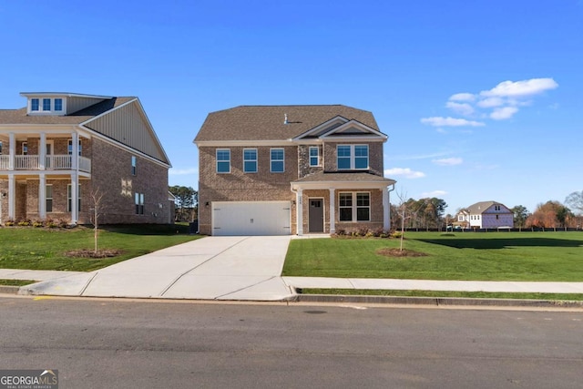 view of front facade featuring a front yard and a garage