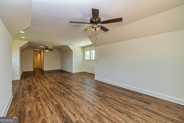 bonus room featuring lofted ceiling, ceiling fan, and dark wood-type flooring