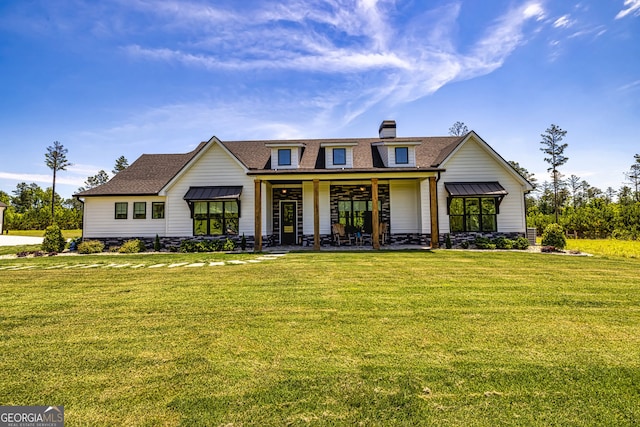 view of front of home featuring a front lawn