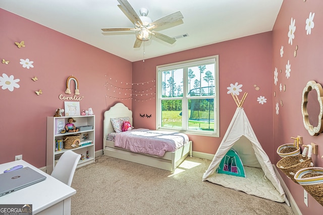 bedroom featuring ceiling fan and carpet floors