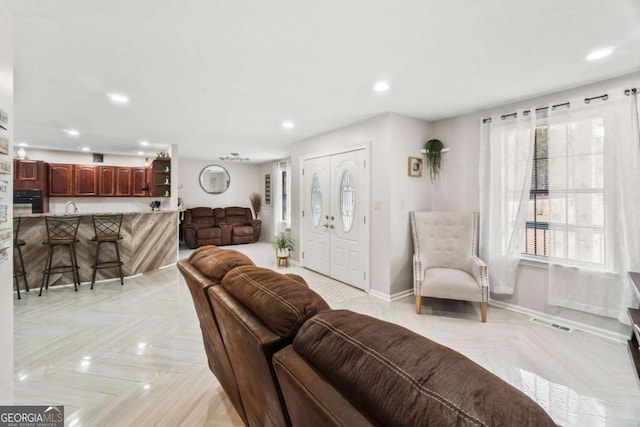 living room with light parquet flooring