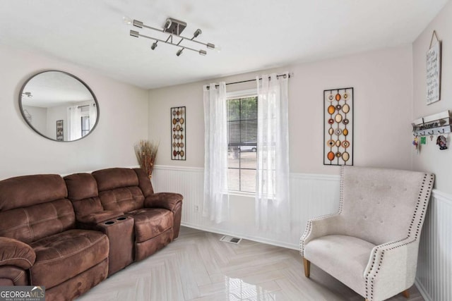 living room with light parquet floors