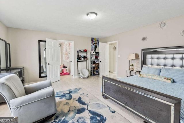 bedroom with light hardwood / wood-style floors