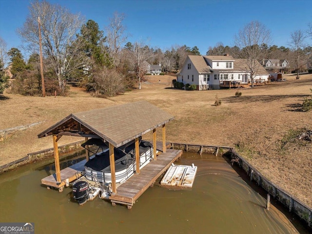 dock area with a water view