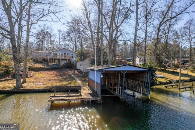 dock area with a water view