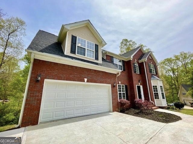 view of front of home with a garage