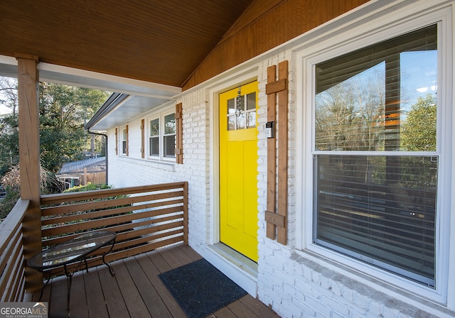 doorway to property with a porch