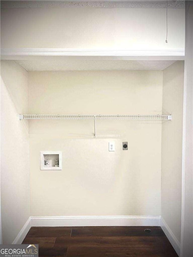 laundry room featuring washer hookup, electric dryer hookup, and dark wood-type flooring