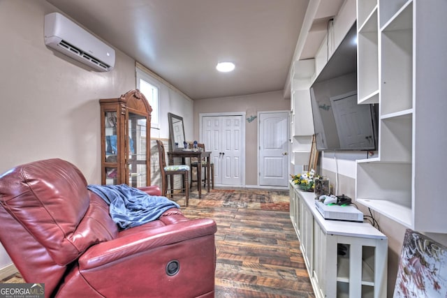 living room featuring dark hardwood / wood-style floors and an AC wall unit