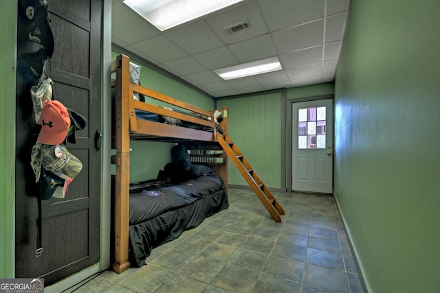 bedroom with a drop ceiling