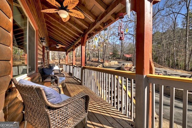 wooden deck with ceiling fan