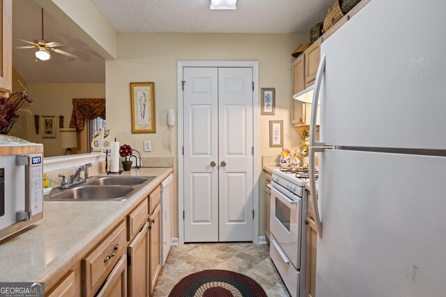 3700 Mays Xing SW, Atlanta, GA 30331 - kitchen featuring white appliances, a sink, ceiling fan, and light countertops