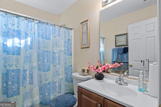 3700 Mays Xing SW, Atlanta, GA 30331 - bathroom featuring toilet, vanity, and a shower with shower curtain