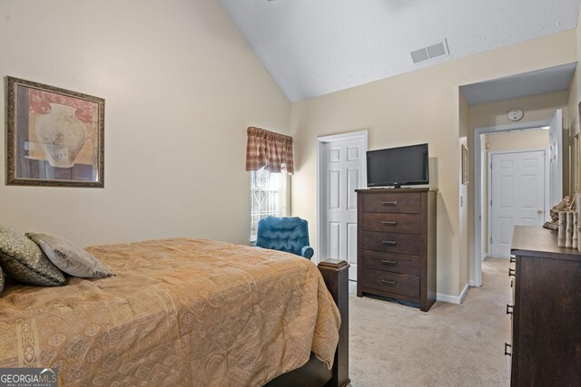 3700 Mays Xing SW, Atlanta, GA 30331 - bedroom featuring light carpet, baseboards, and high vaulted ceiling