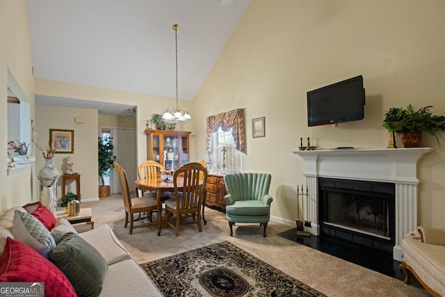 3700 Mays Xing SW, Atlanta, GA 30331 - living area featuring high vaulted ceiling, light colored carpet, a chandelier, a fireplace with flush hearth, and baseboards