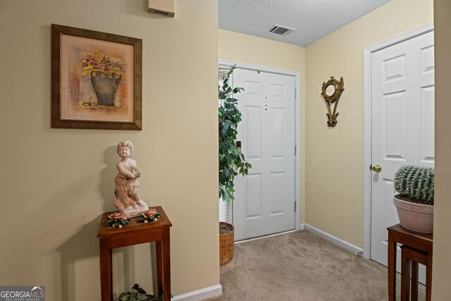 3700 Mays Xing SW, Atlanta, GA 30331 - entrance foyer featuring carpet floors, baseboards, and a textured ceiling