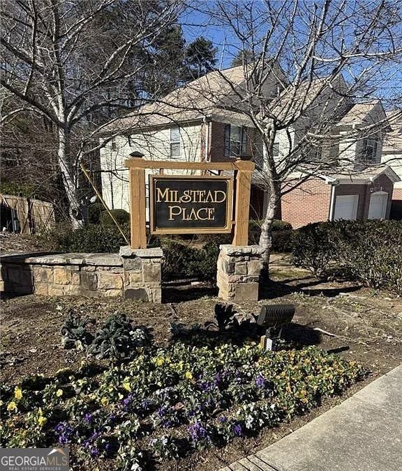 view of community sign