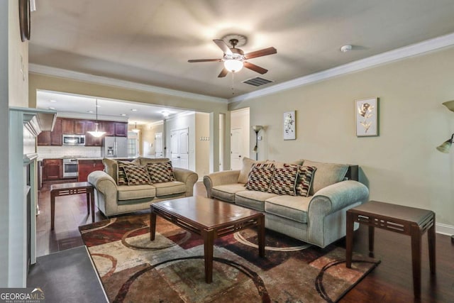 living room featuring crown molding, ceiling fan, and wood-type flooring