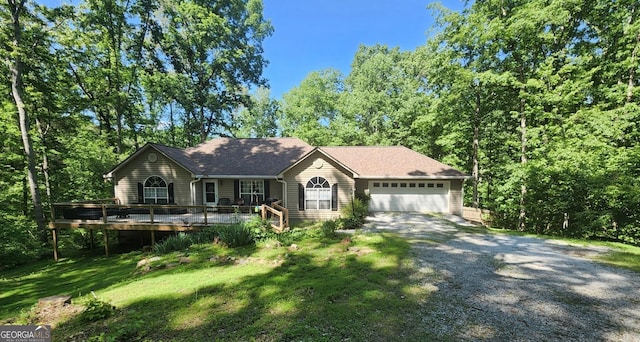 390 Apple Rdg Unit 2, Dawsonville, GA 30534 - ranch-style home with gravel driveway, an attached garage, a deck, and a front lawn