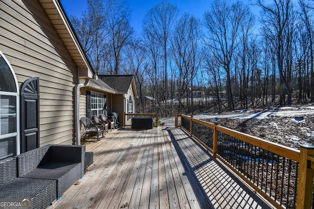 view of snow covered deck