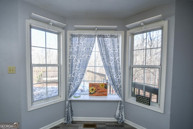 390 Apple Rdg Unit 2, Dawsonville, GA 30534 - detailed view of wood finished floors and baseboards